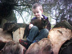 Joel (aged 6) with Sarah our Brown Burmese girl (aged 16)!